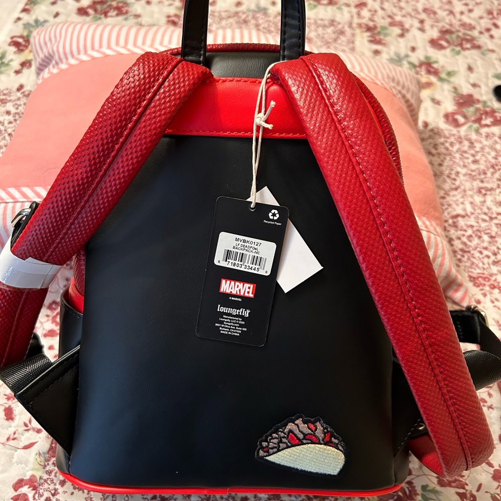 This is a new Deadpool loungefly backpack new with tags.